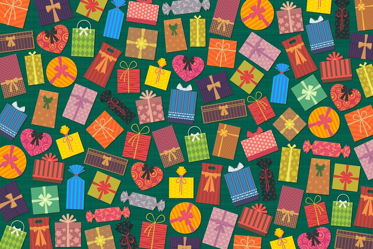 Colourful gift boxes on a patterned background.